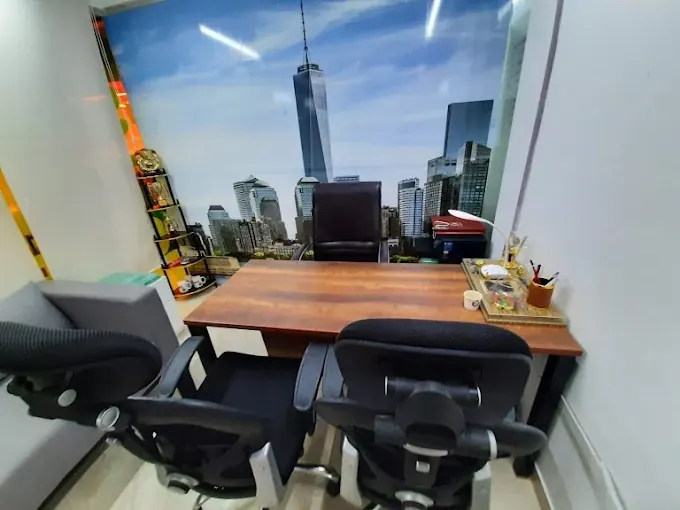 Our private office with a desk and visitor seating