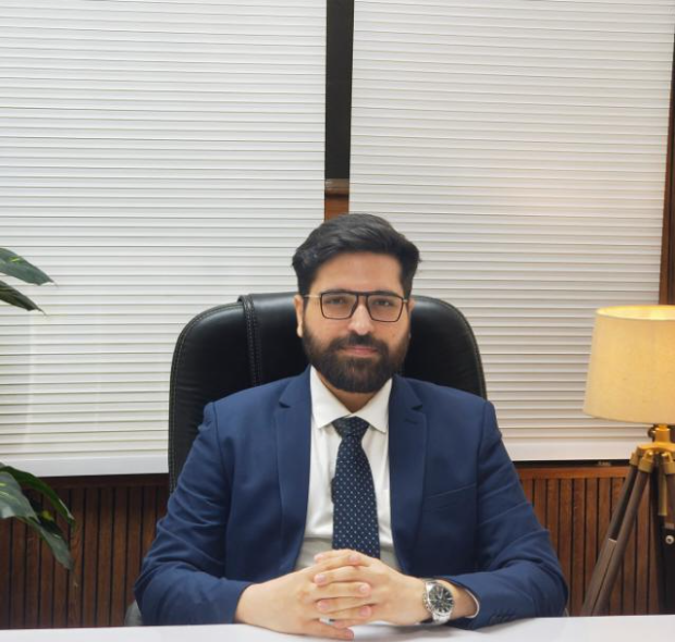 CA Lovjeet Singh, founder of L Singh & Associates, seated at his desk
