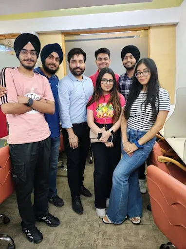 The L Singh & Associates team together at the office